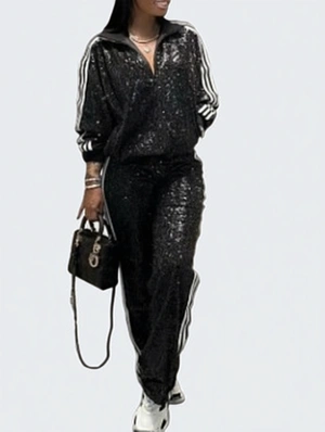 A Zipper Up Long Sleeved Top And Straight Leg Trousers Two Piece Set